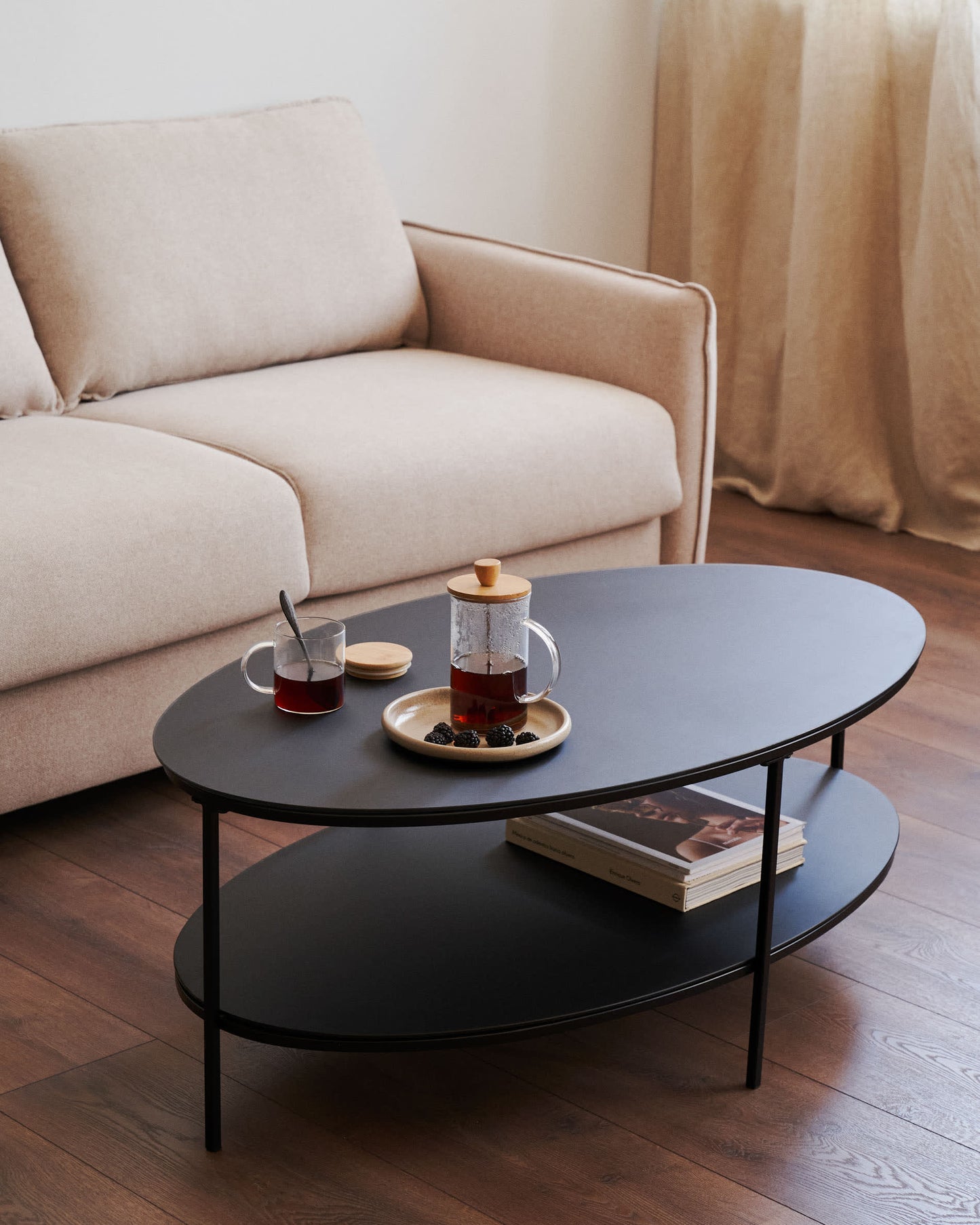 NOVA TEMPERED GLASS AND METAL COFFEE TABLE WITH A MATTE BLACK FINISH